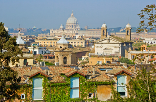 View across the rooftops of Rome and the  cupola of St. Peter’s in the  Vatican City.