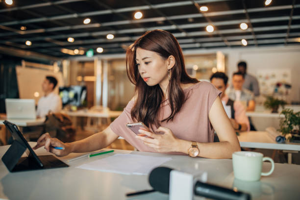istock Woman in modern office 1183447192