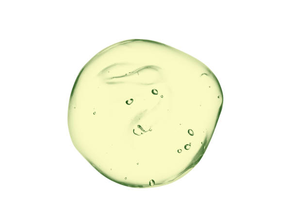 gesichtsserum, grüne kosmetische flüssige gel-swatch isoliert auf weißem hintergrund - animal serums stock-fotos und bilder