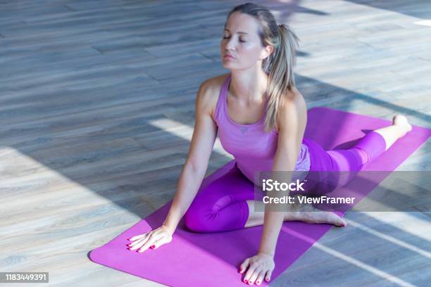Beautiful Woman Stretching Hip Stock Photo - Download Image Now - Hip - Body Part, Relaxation Exercise, Stretching