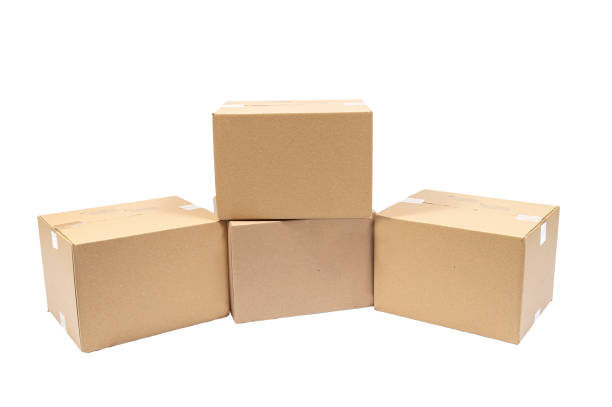Four Blank Shipping Boxes Isolated On White stock photo