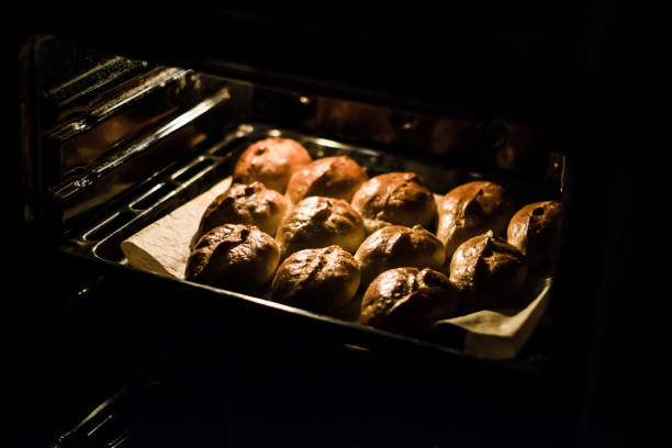 istock Baked pies on a tray in the oven 1183452433