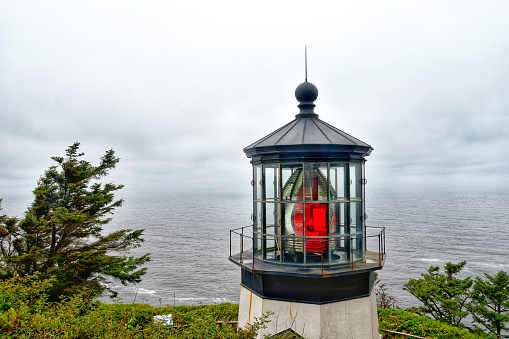 Picture of the Cape Meares Lighthouse with fresnel lens in Oregon, USA.