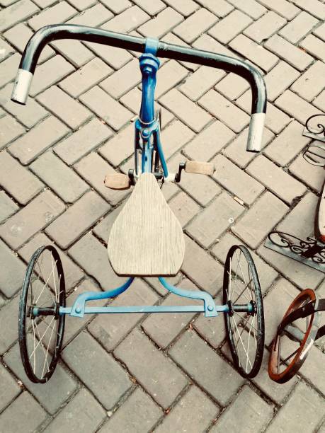 being child Vintage style Blue bicycle is waiting for next owner at flea market antique market belgium stock pictures, royalty-free photos & images