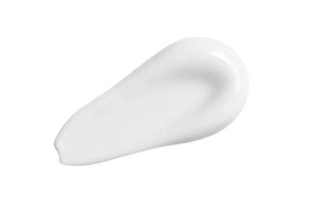 istock White cosmetic cream smudge isolated on white background 1183460931
