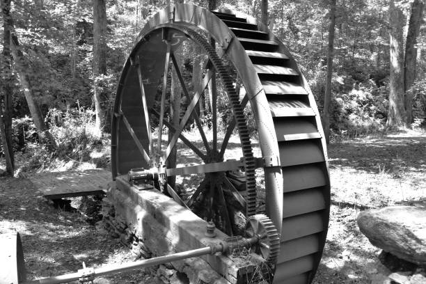 Gold ore mills. Medieval wooden water mills in Zlate Hory, Czech Republic. Black and white image.