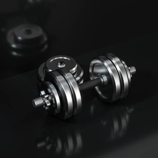 istock Dumbbells with black background, fitness theme, 3d rendeirng. 1183464996
