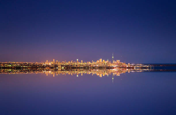 istock Toronto harbour marina apartments CN Tower illuminated night 1183465597