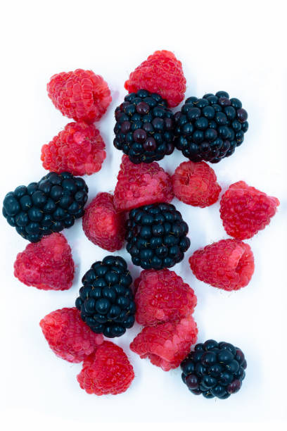 istock organic rasberries and blackberries over head macro still life image 1183465627