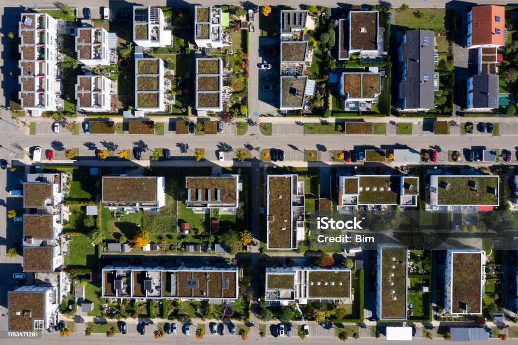 Residential Neighborhood from Directly Above Modern housing development with houses and apartment buildings viewed from above. Real Estate Stock Photo