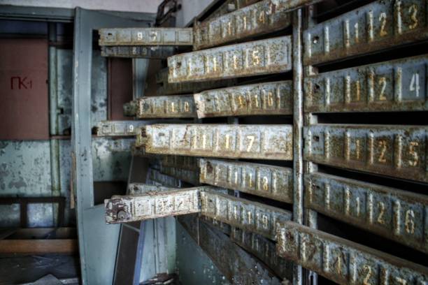 Rusty open mailboxes in an abandoned building in Pripyat, Ukraine, site of the 1986 Chernobyl nuclear desaster and center of the Chernobyl exclusion zone.