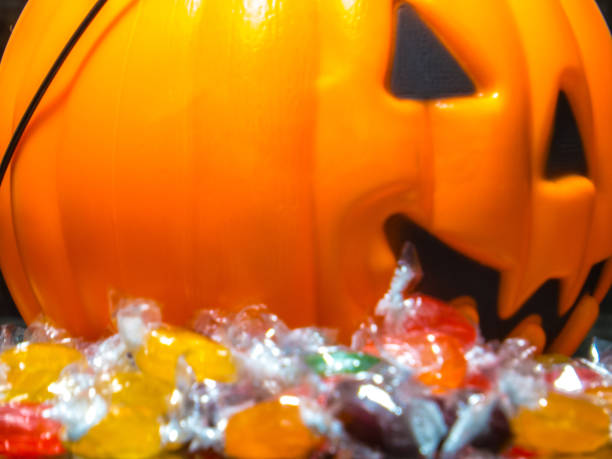 istock Halloween pumpkin and candies 1183475613