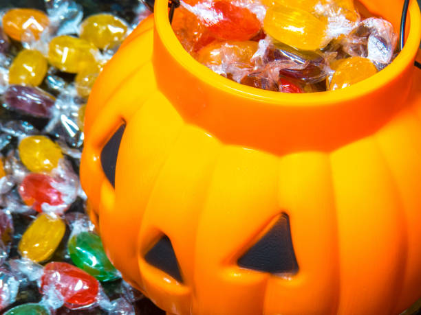 istock Halloween pumpkin and candies 1183475618