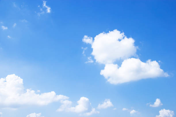 istock Blue sky background and white clouds soft focus, and copy space 1183476603