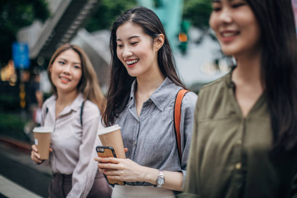 istock Three young women  in the city 1183476758