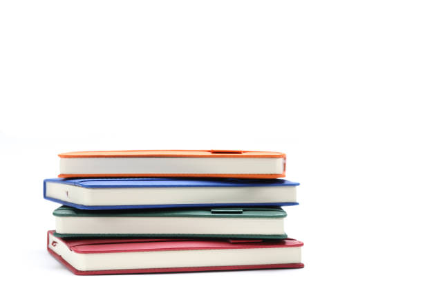 Lot of diary isolated on white background. Business education concept. Office supplies.
