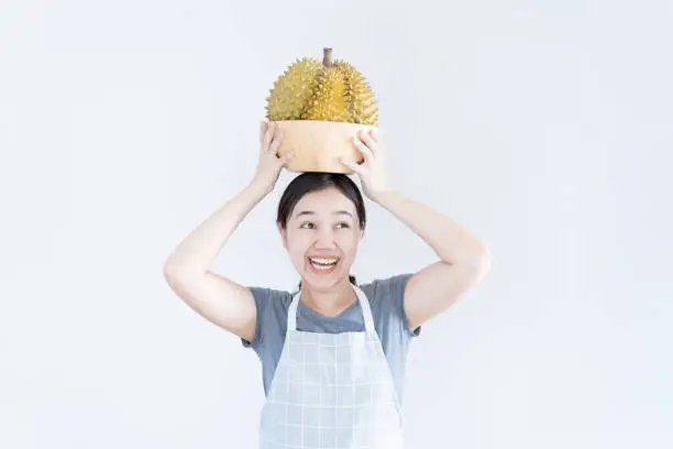 Photo of Woman and durian portrait.