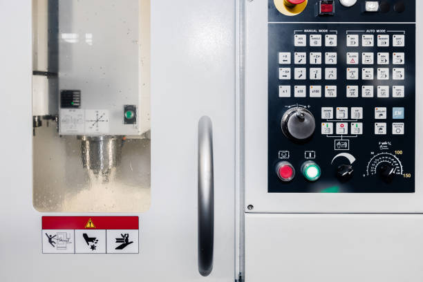 istock Many kind of switch and turn dials of control panel for adjust parameter cnc lath machine at factory. 1183479386