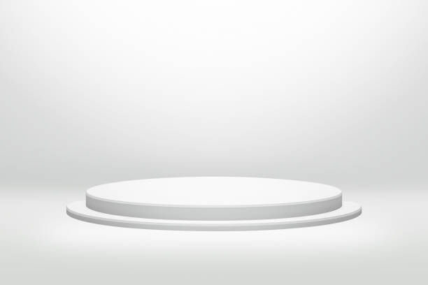 istock White podium stand in round shape with cylinder concept on modern room background. Empty counter shelf and product backdrops. 1183482822