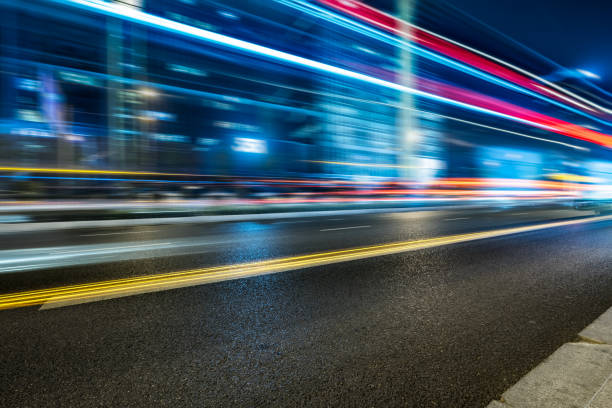 istock the light trails on the modern building background