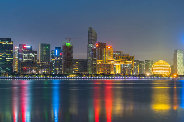 istock night view of modern city waterfront downtown skyline,China 1183483867