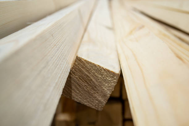 istock Wood, timber, construction material stacked in the warehouse. 1183488923
