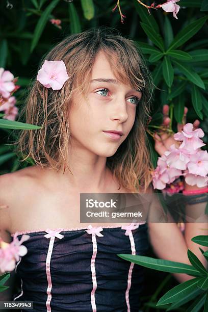 Oleander Girl Stock Photo - Download Image Now - Adolescence, Black Color, Blue
