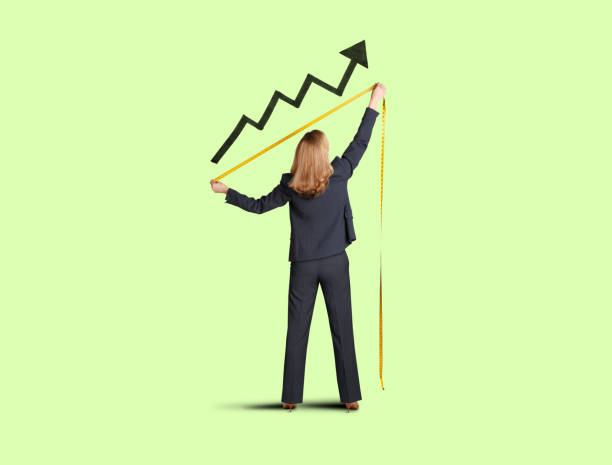 istock Businesswoman Measuring Progress 1183501517