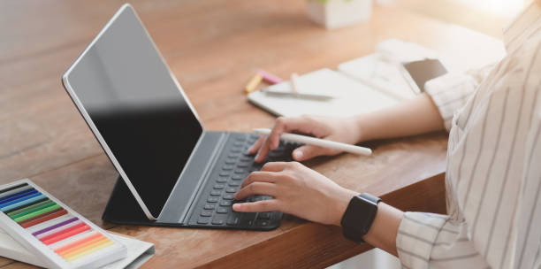 istock Cropped shot of young professional designer working on her project 1183502169