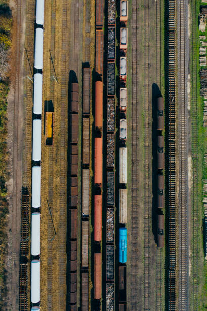istock Top view of colorful cargo trains. 1183507585