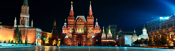 Moscow Red Square at night with the illuminated State Historical Museum, clear skies, travel and cultural themes. Moscow, Russia