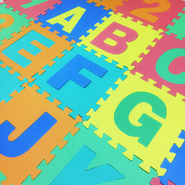 istock A, B, C, E, F,G and J text jigsaw tile floor on white background , Interlocking EVA Foam 1183508594