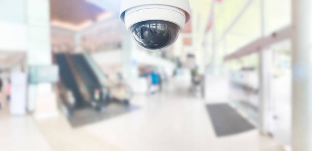 istock CCTV Security Camera operating in hospital on blur background. 1183515241