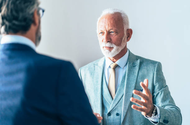 istock Senior business conversation 1183523171