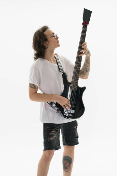 istock Attractive young man playing a guitar 1183531215