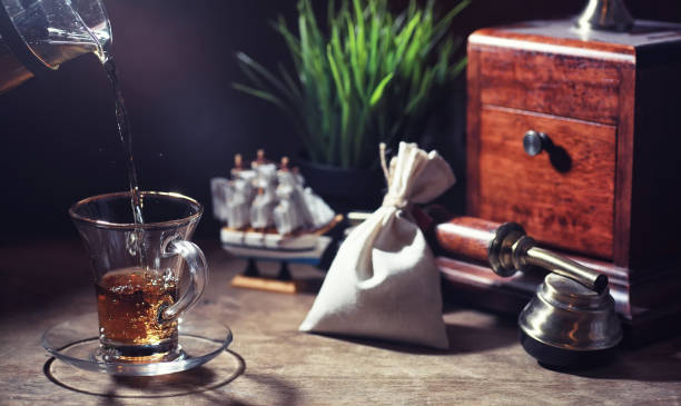 istock Brewing tea on a wooden table 1183533377