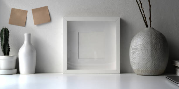 istock Photo frame mock up with ceramic vase 1183533686