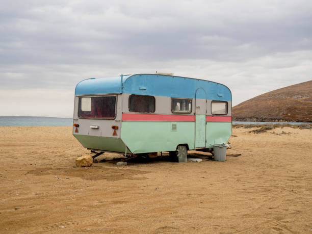 istock Retro caravan near the sea 1183538663