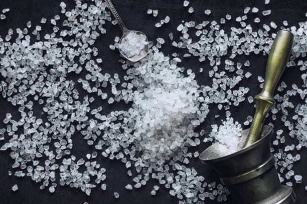 istock Large sea salt. Spice. Mortar and pestle for grinding. 1183539187