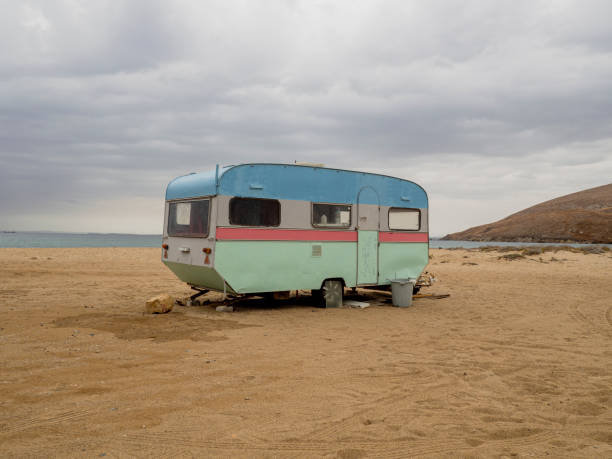 istock Retro caravan near the sea 1183539189