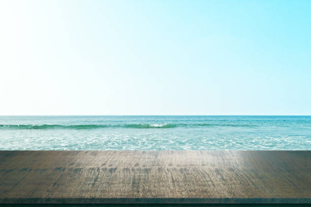 istock Blank wooden counter on beach 1183539205