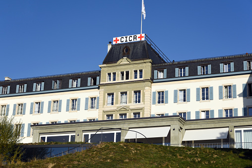 The headquarters of the ICRC (The International Committee of the Red Cross) in Geneva. \nThe humanitarian institution has arround 15'500 employees wordwide. The image was captured during autumn season at a sunny day.