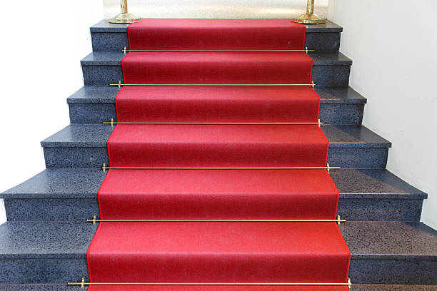 istock marble stairs with red carpet 118354303