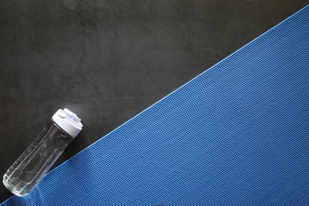 istock Mat for practicing yoga on the floor. Healthy lifestyle. 1183543100