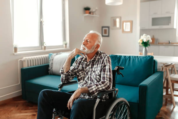 istock Disabled Man in Wheelchair 1183544344