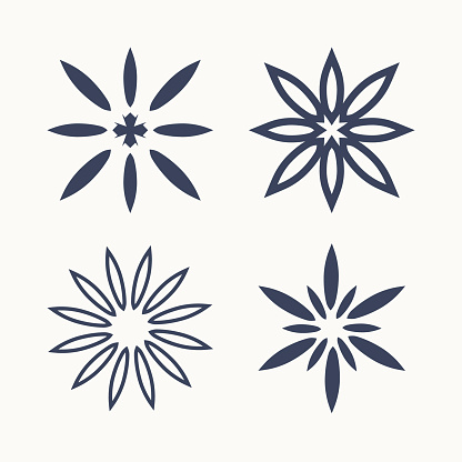 Set of four simple star stencil patterns. The shape typed from the laconic rays of the petals is possible plotter cutting.