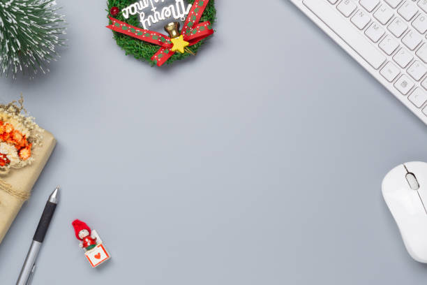 istock Merry Christmas and Happy new years office work space desktop concept. Flat lay top view with keyboard and Christmas ornaments with copy space. 1183550525