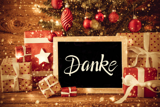 istock Christmas Tree, Gift, Text Danke Means Thank You, Snowflakes 1183554129
