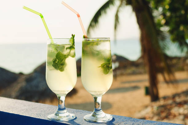 istock Two glasses of famous Cuban cocktail - Mojito. 1183560021