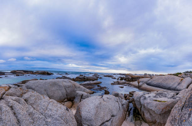 Cape Town beach with rocks and mountains